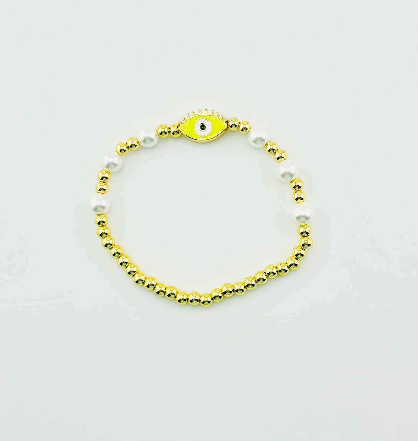 Yellow evil eye bracelet with gold filled