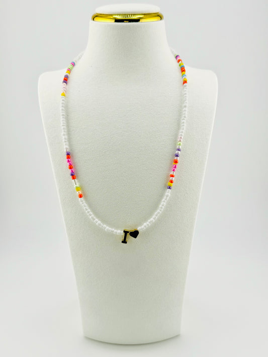 I beaded Initial necklace in white and pastel colors