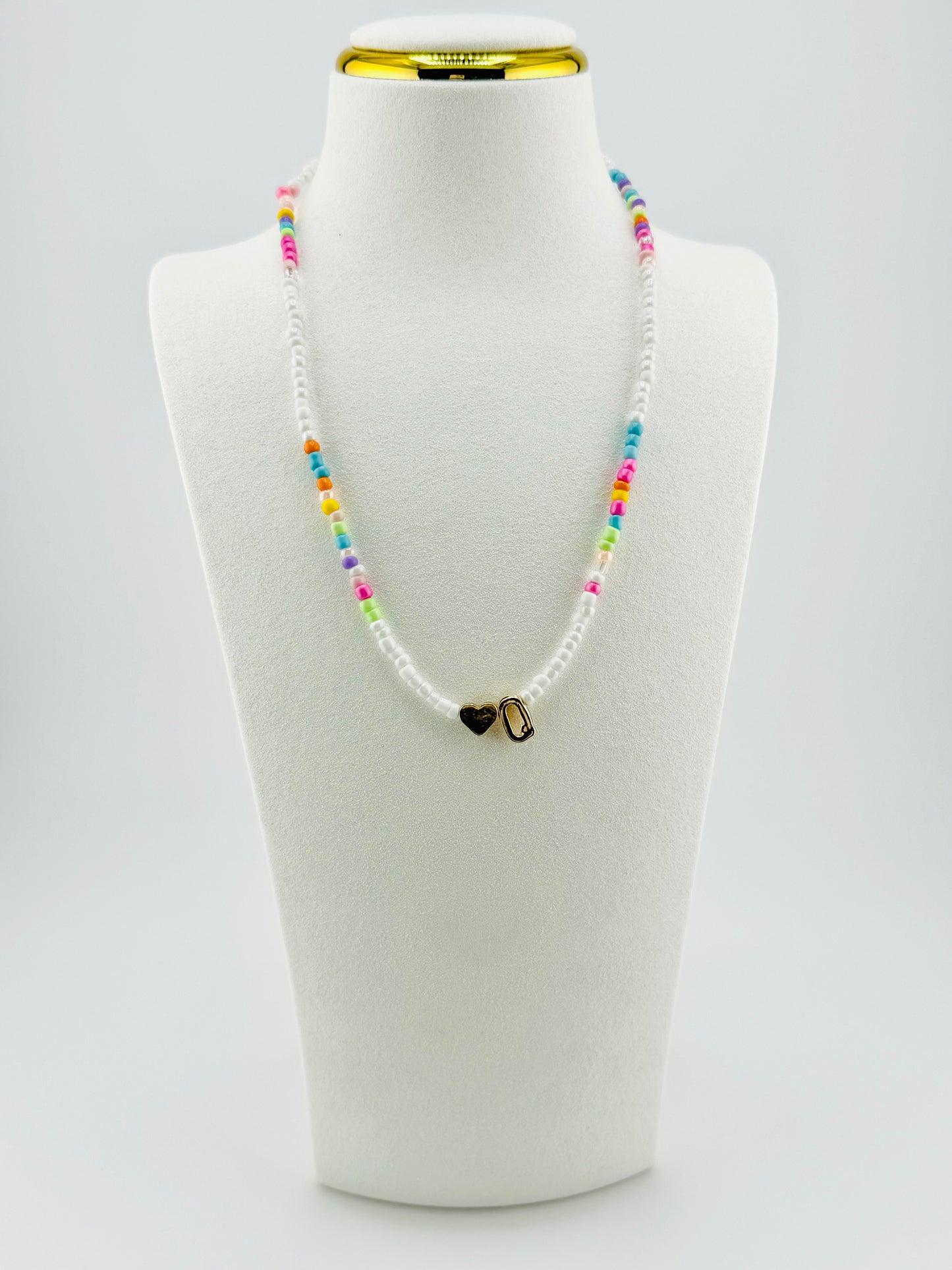 Q beaded Initial necklace in white and pastel colors