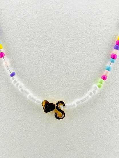 S beaded Initial necklace in white and pastel colors