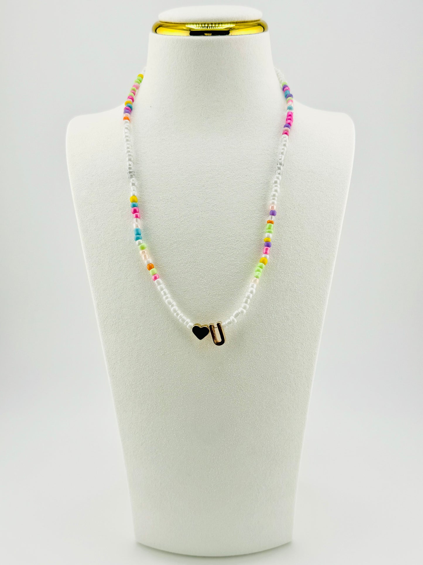 U beaded Initial necklace in white and pastel colors