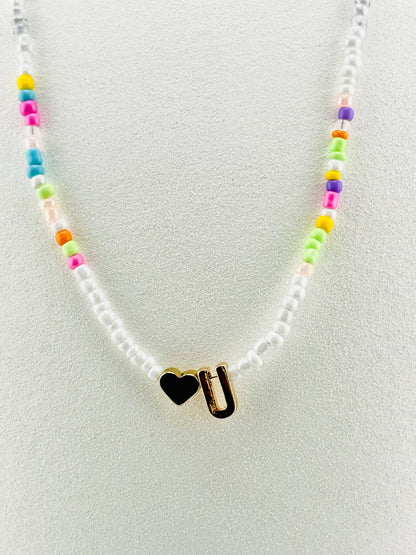 U beaded Initial necklace in white and pastel colors