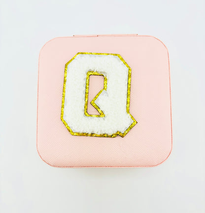 Letter Q travel jewelry case in pink