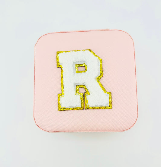 Letter R travel jewelry case in pink