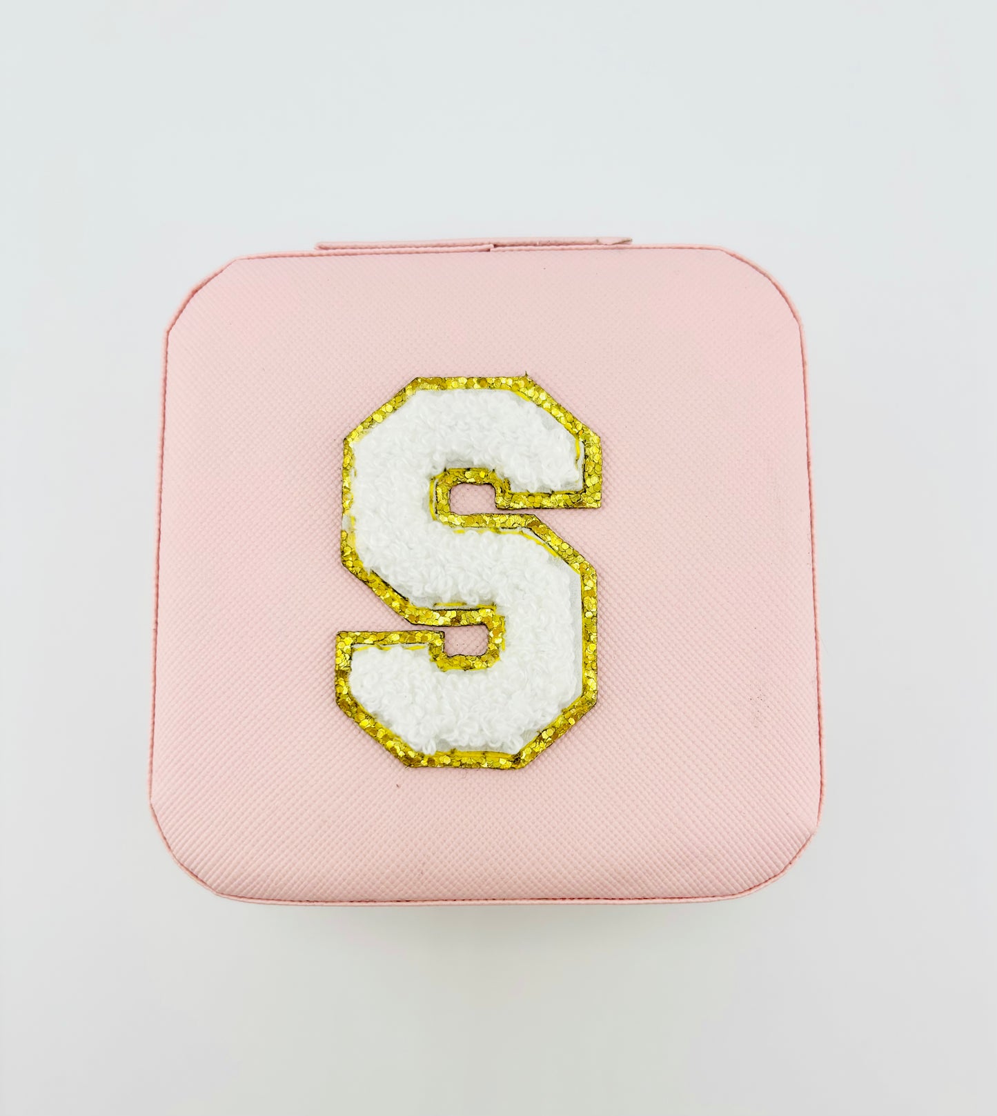 Letter S travel jewelry case in pink