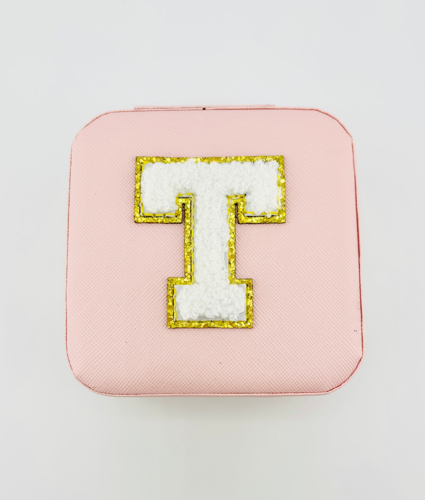 Letter T travel jewelry case in pink