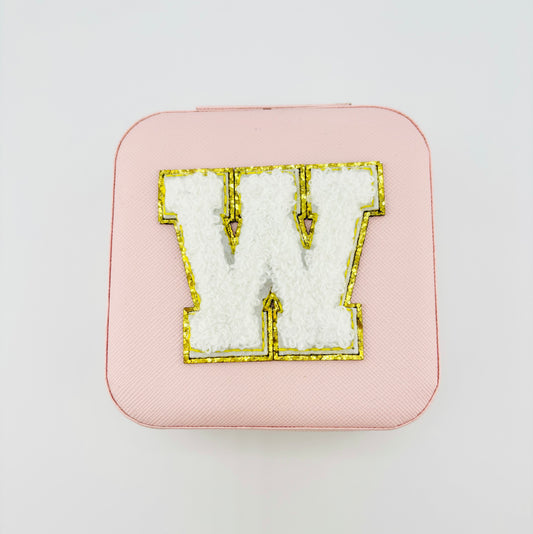 Letter W travel jewelry case in pink