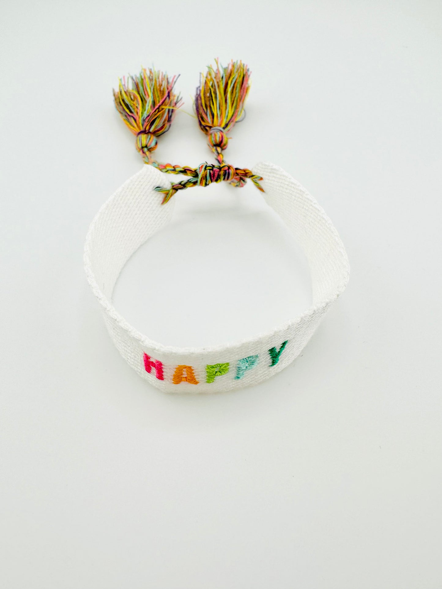 Happy woven bracelet in white with colorful letters adjustable