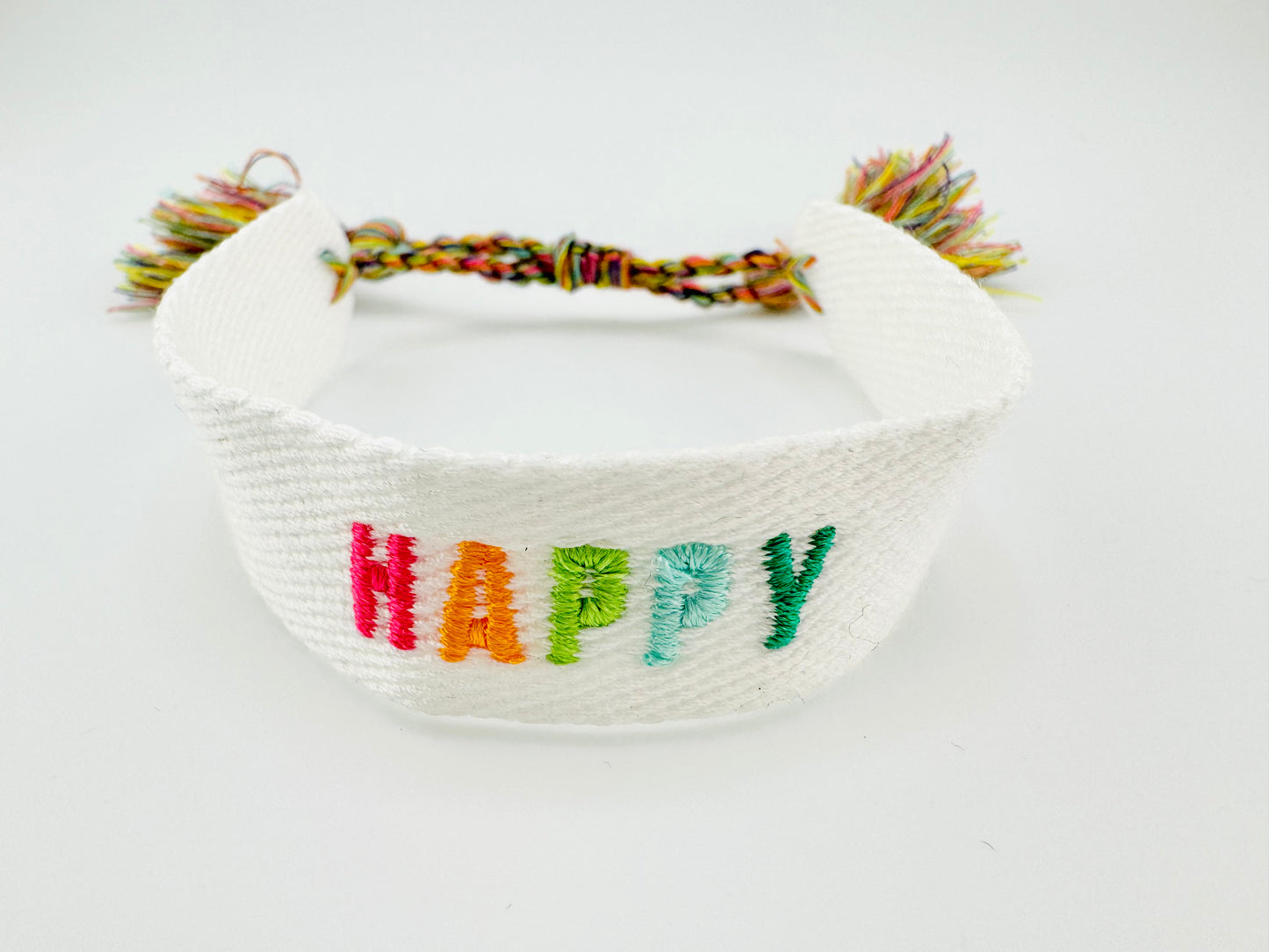 Happy woven bracelet in white with colorful letters adjustable