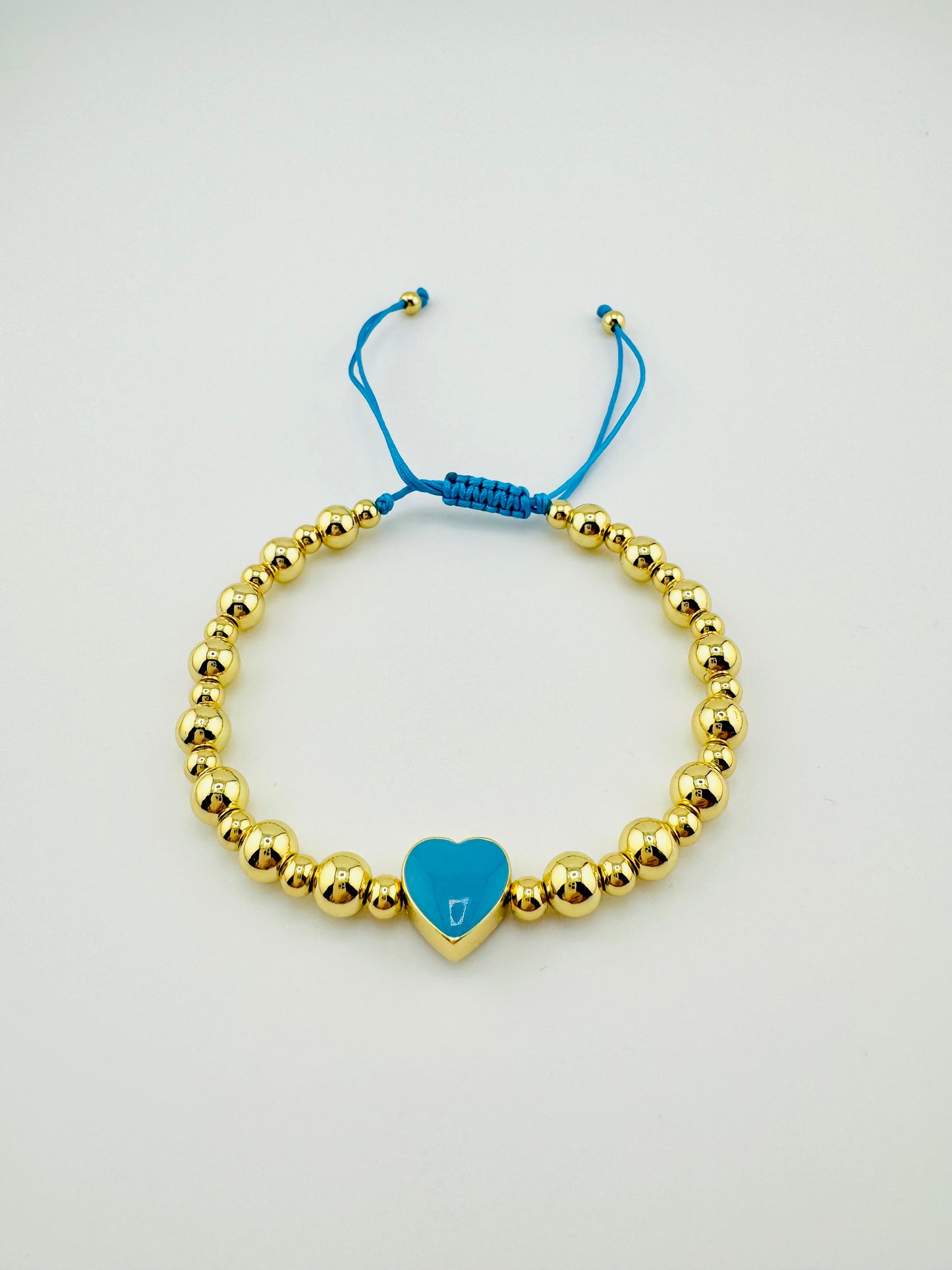 Julia gold filled bracelet with a turquoise heart