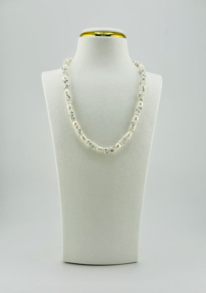 Penelope necklace is clay beads with fresh water pearls