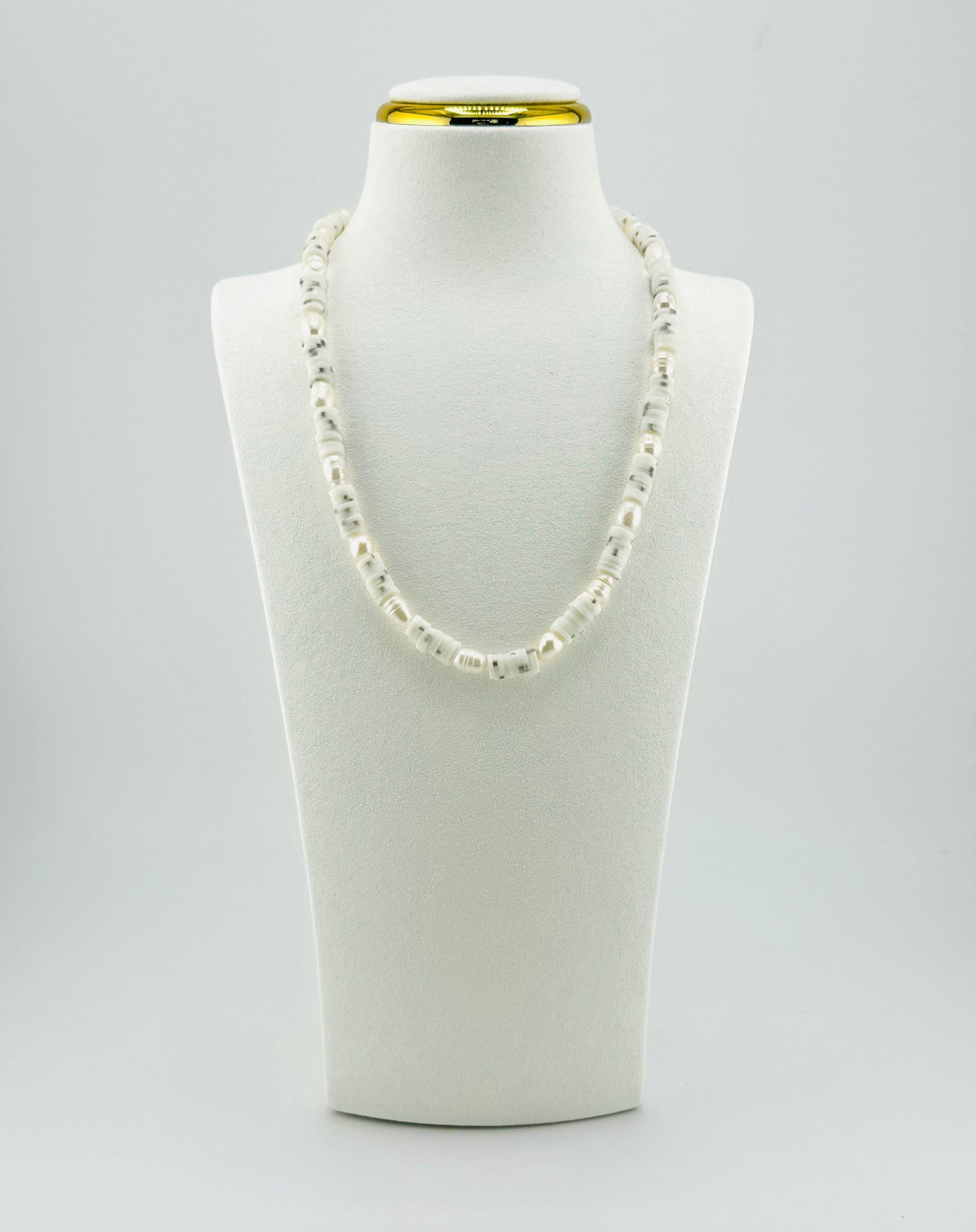 Penelope necklace is clay beads with fresh water pearls