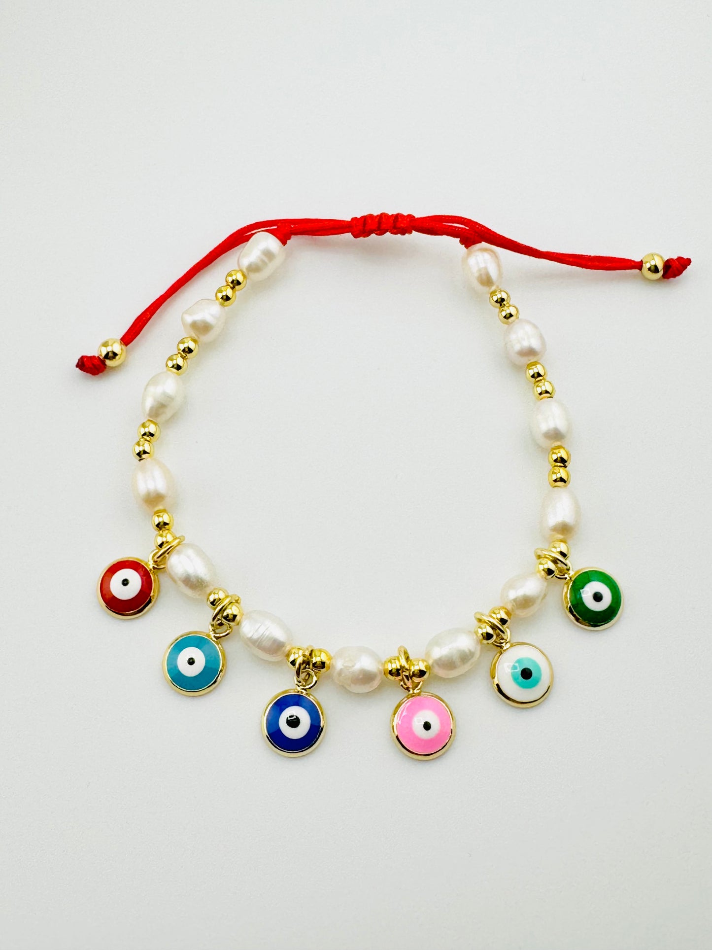 Jocie fresh water pearl and evil eye bracelet