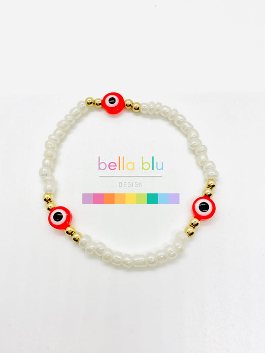 white and red evil eye bracelet