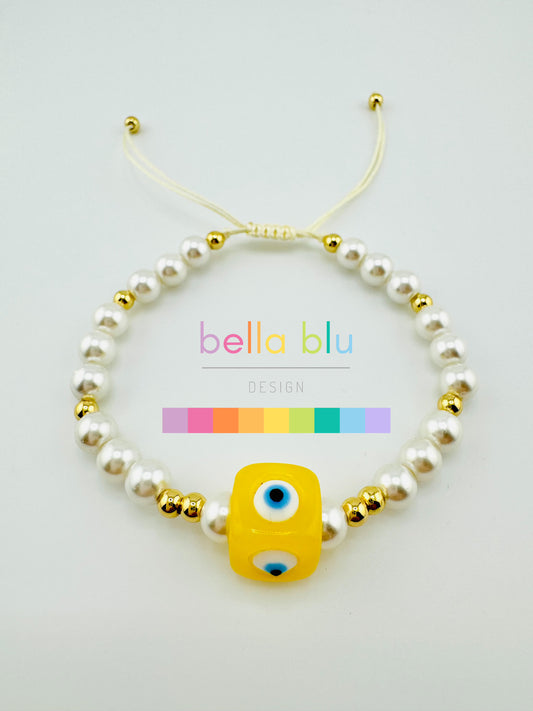 Scarlet yellow evil eye with faux pearl bracelet