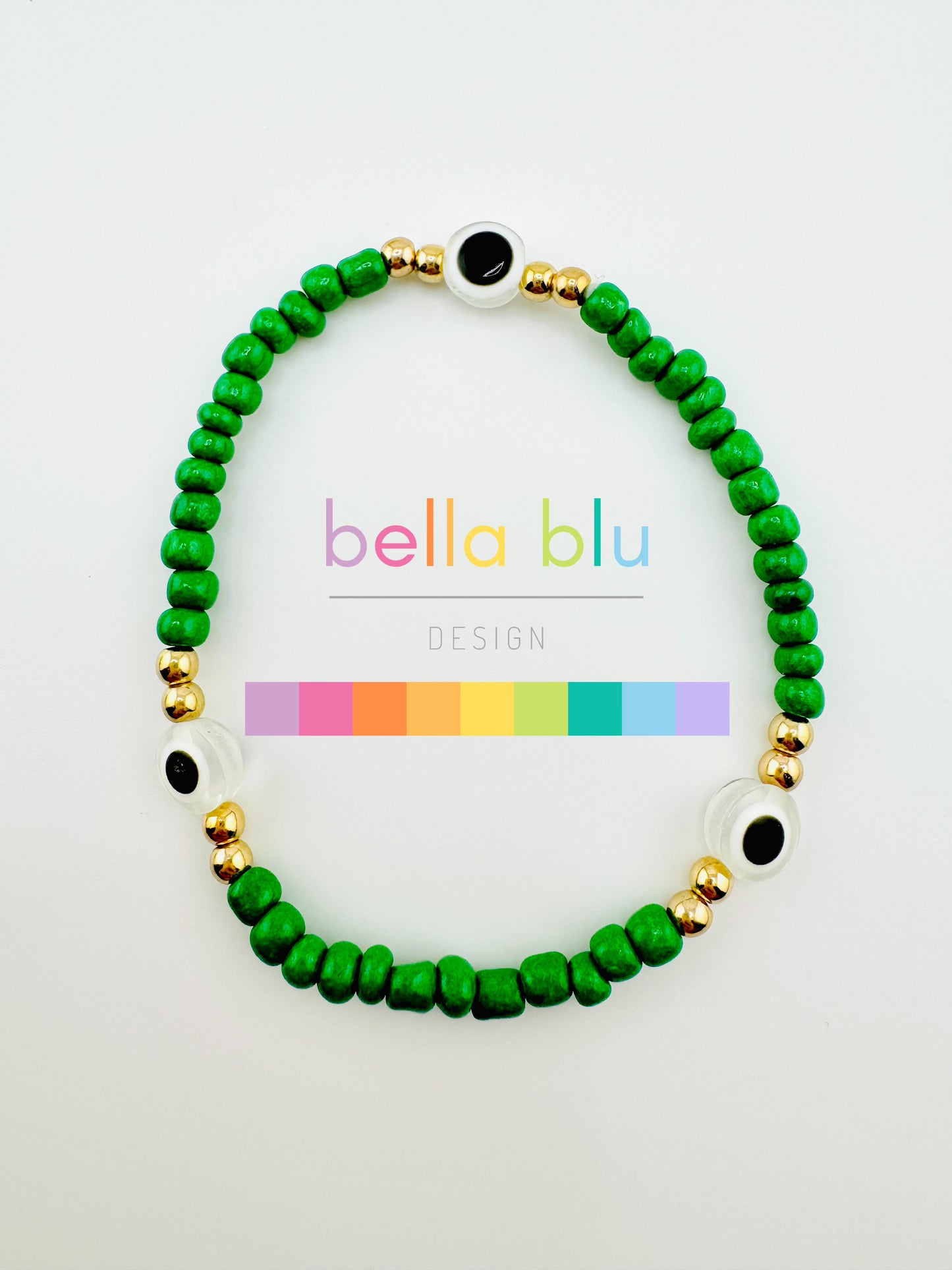 Green and gold evil bracelet